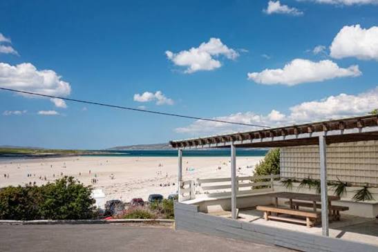 Terrace overlooking the beach at Carnaween House